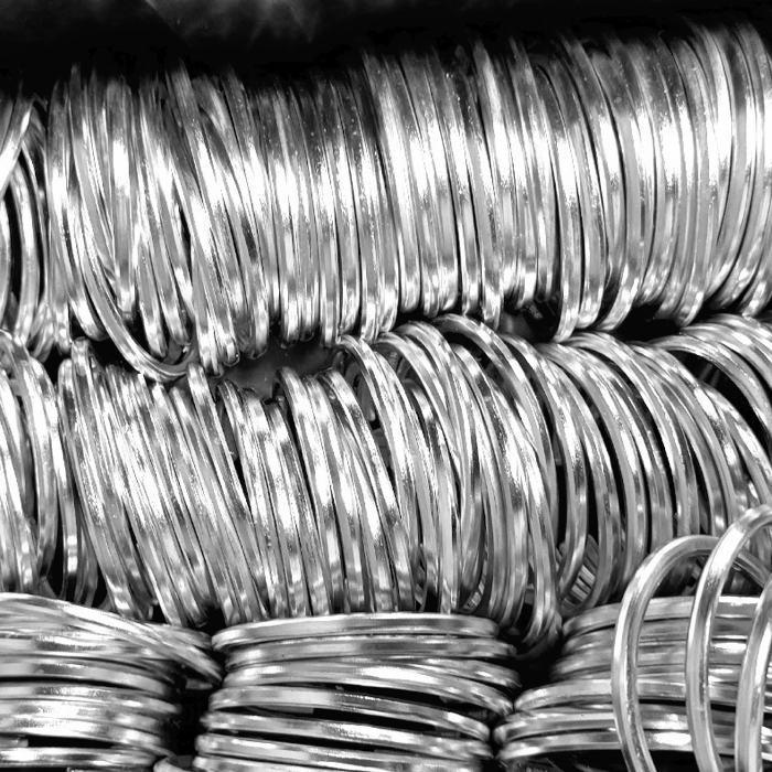 Original production photograph of silver cuffs from the SkyBolt makers